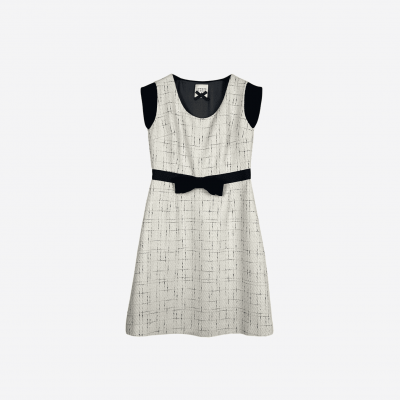 Short Edward Achour ecru tweed dress with black ribbon.