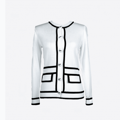 Edward Achour black and white cardigan with gold buttons.
