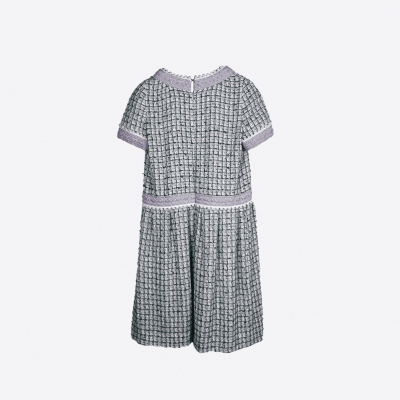 Short Edward Achour dress in green and lilac tweed, with elegant buttons.