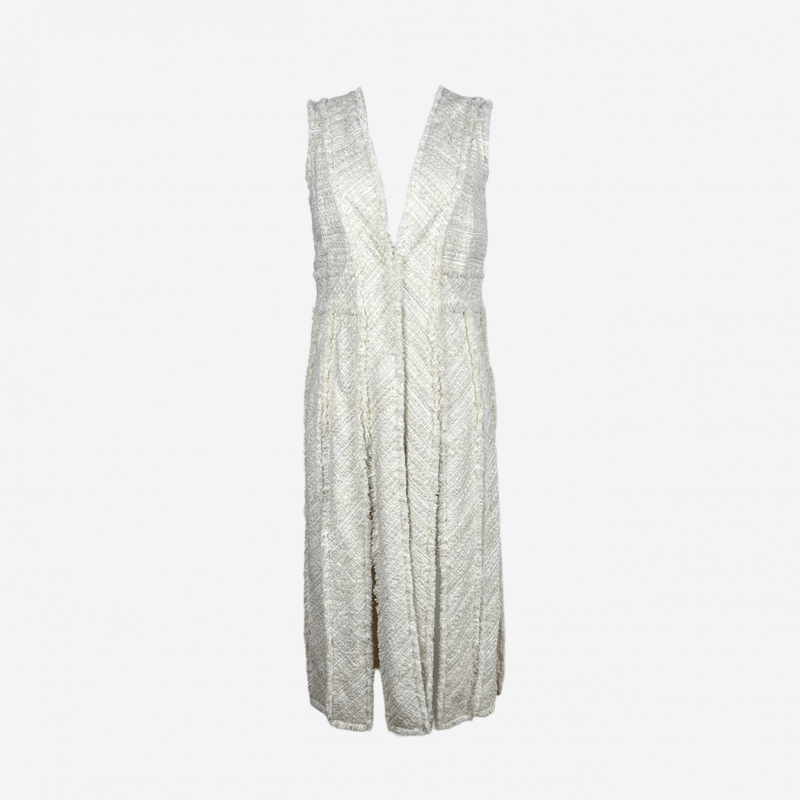 Edward Achour long ecru tweed coat with lace and fringe.