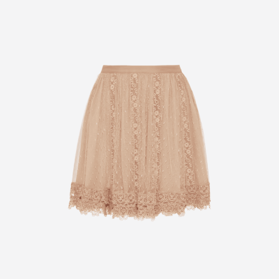 Valentino short skirt in blush beige tulle with lace details.
