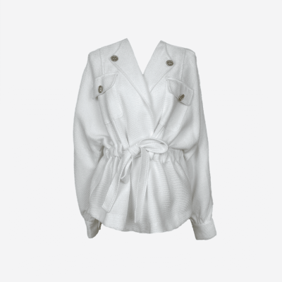 Edward Achour white belted jacket with gold buttons.