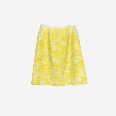 Edward Achour yellow tweed midi skirt with off-white trim.