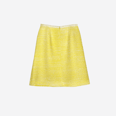 Edward Achour yellow tweed midi skirt with off-white trim.