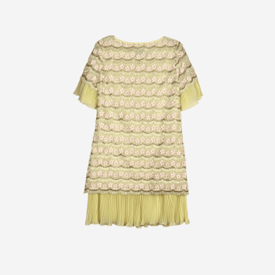 Short pale yellow Edward Achour dress with floral details.