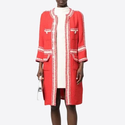 Edward Achour mid-length coat in red tweed, embellished with jewel buttons.